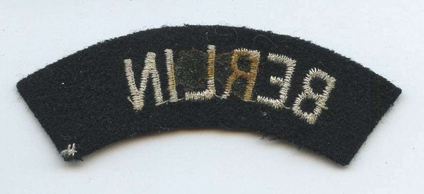 banane de bras Berlin , noire, inscriptions blanches