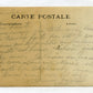 carte photo d'un poilu redescendant des lignes équipé capote Poiret vers 1915 texte au dos