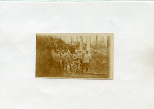 petite photo d'un groupe de poilus nominative février 1916