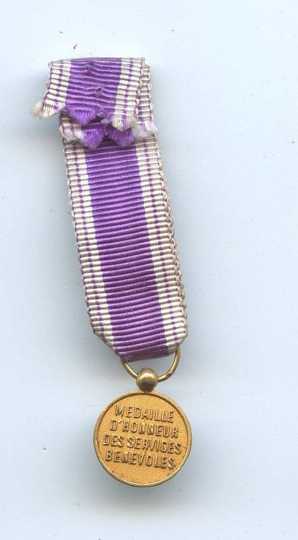 réduction commandeur médaille des services bénévoles